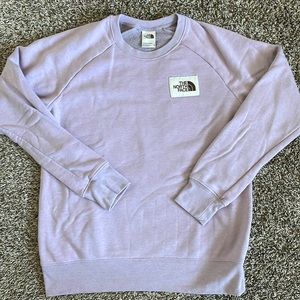Medium women’s purple north face sweatshirt